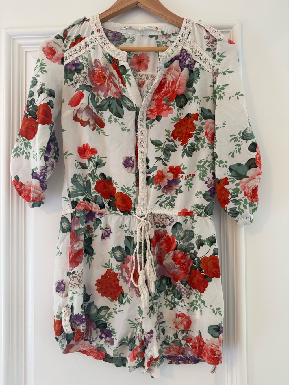 Chelsea & Violet Floral Romper in White with Red and Purple Blooms